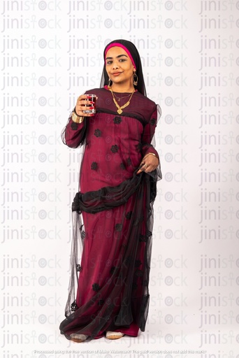 Nubian woman from Egypt drinking tea