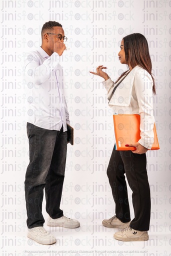 Egyptian man and woman talking at work