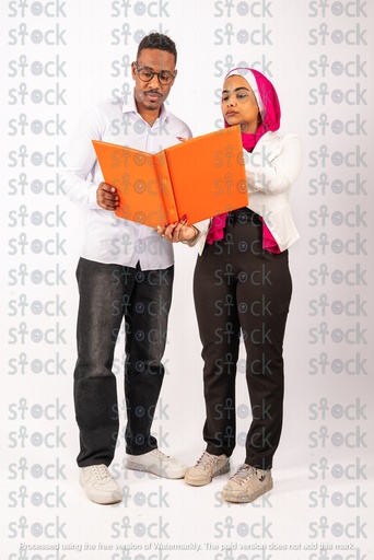 Man and woman holding an orange file