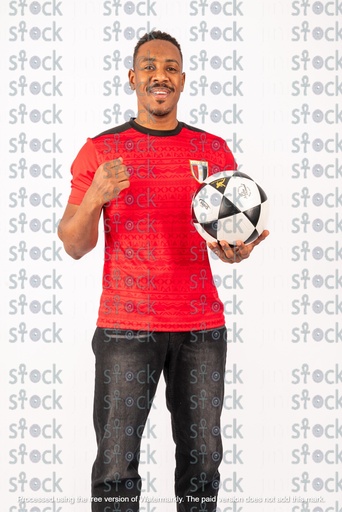 Nubian youth holding a football