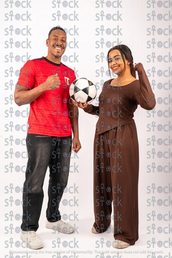 Nubian boy and girl who are football fans
