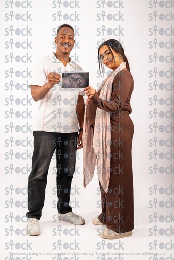 Nubian mother and father with the new baby's ultrasound