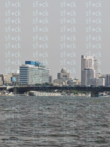 The Nile embraces the Qasr El Nil Bridge in a calm atmosphere