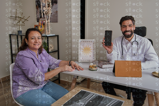 Doctor and patient at desk