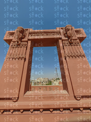 Monumental gateway, warm terracotta hue