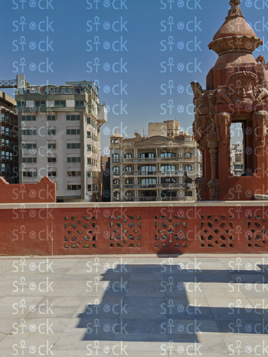 Rooftop statues overlooking city