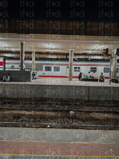 Trains Await Under the Yellow Lights 